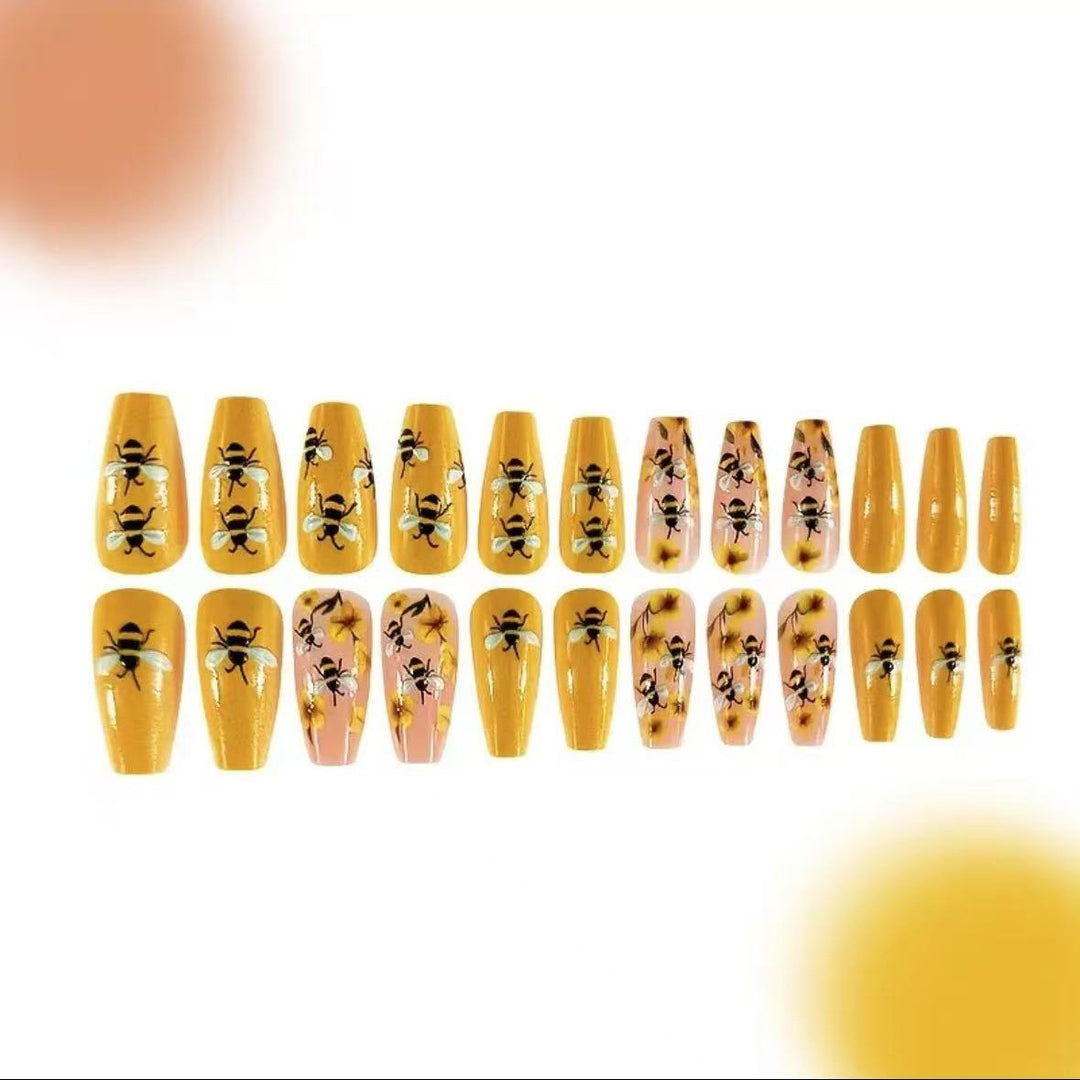 Nail art set with creative bee and flower designs Stornfield