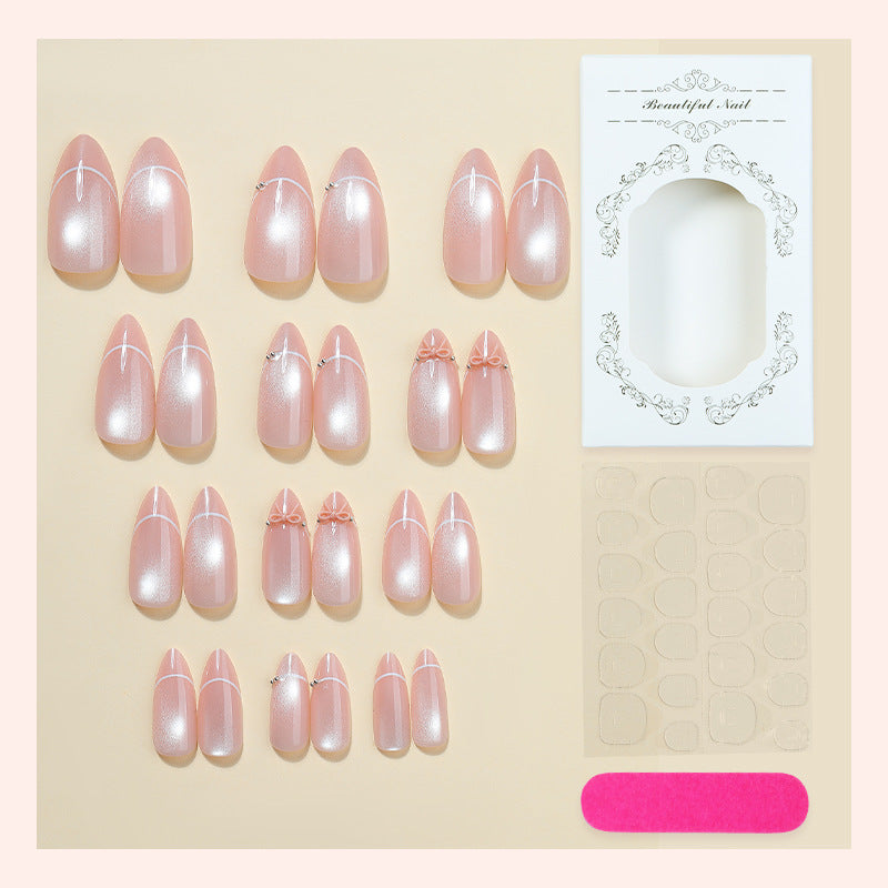 Artificial nail set with elegant bow and glitter accents Stornfield 1789119022
