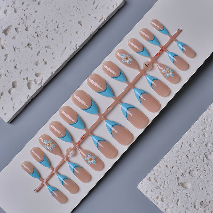 Artistic Press-On Nail Kit with Floral Accents Stornfield