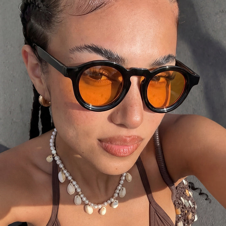 Women's fashionable round sunglasses with transparent frame and UV protection Stornfield