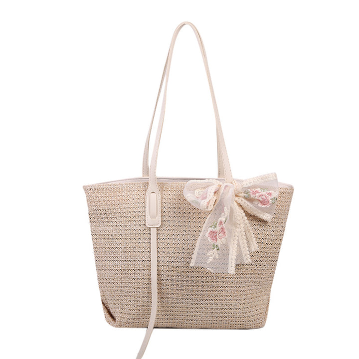 Elegant Woven Straw Tote Bag with Decorative Bow