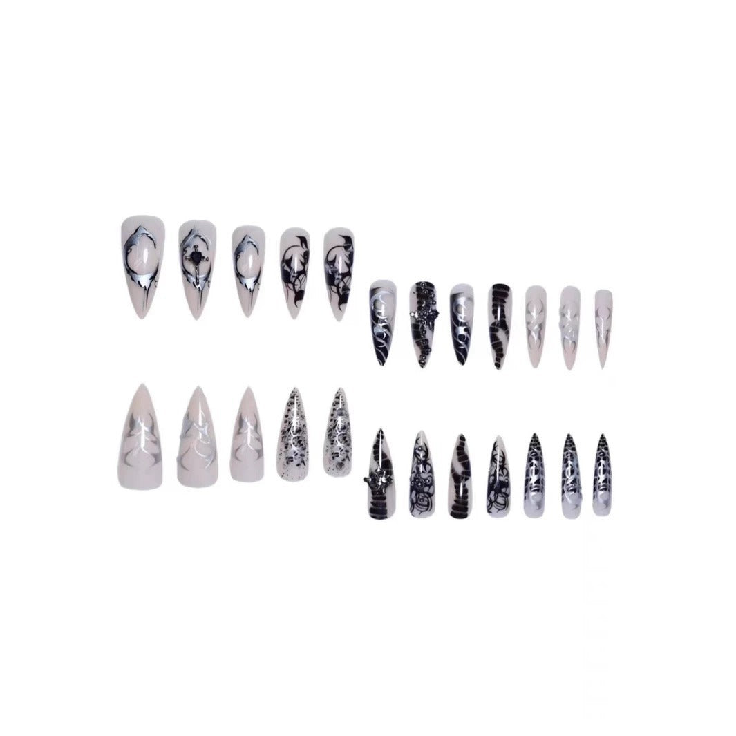 Artistic Stiletto Nail Extensions with Black Detailing Stornfield