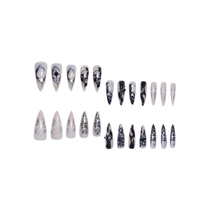 Artistic Stiletto Nail Extensions with Black Detailing Stornfield