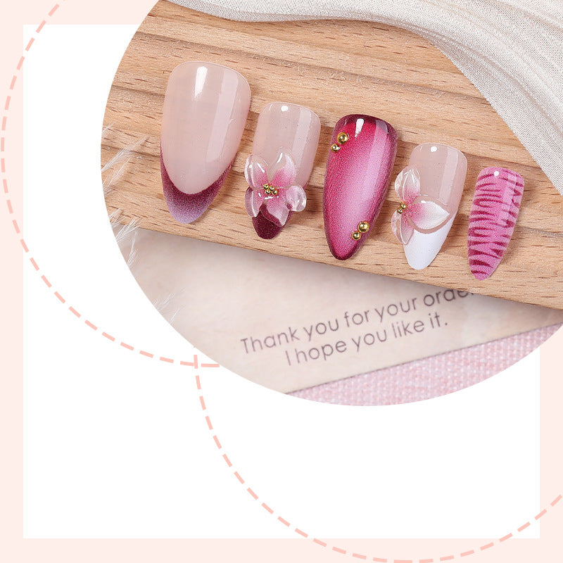 Artificial nail set with floral accents and ombre effect Stornfield