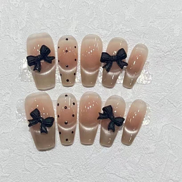 Stylish Long Press-On Nail Set with Bow Accents Stornfield