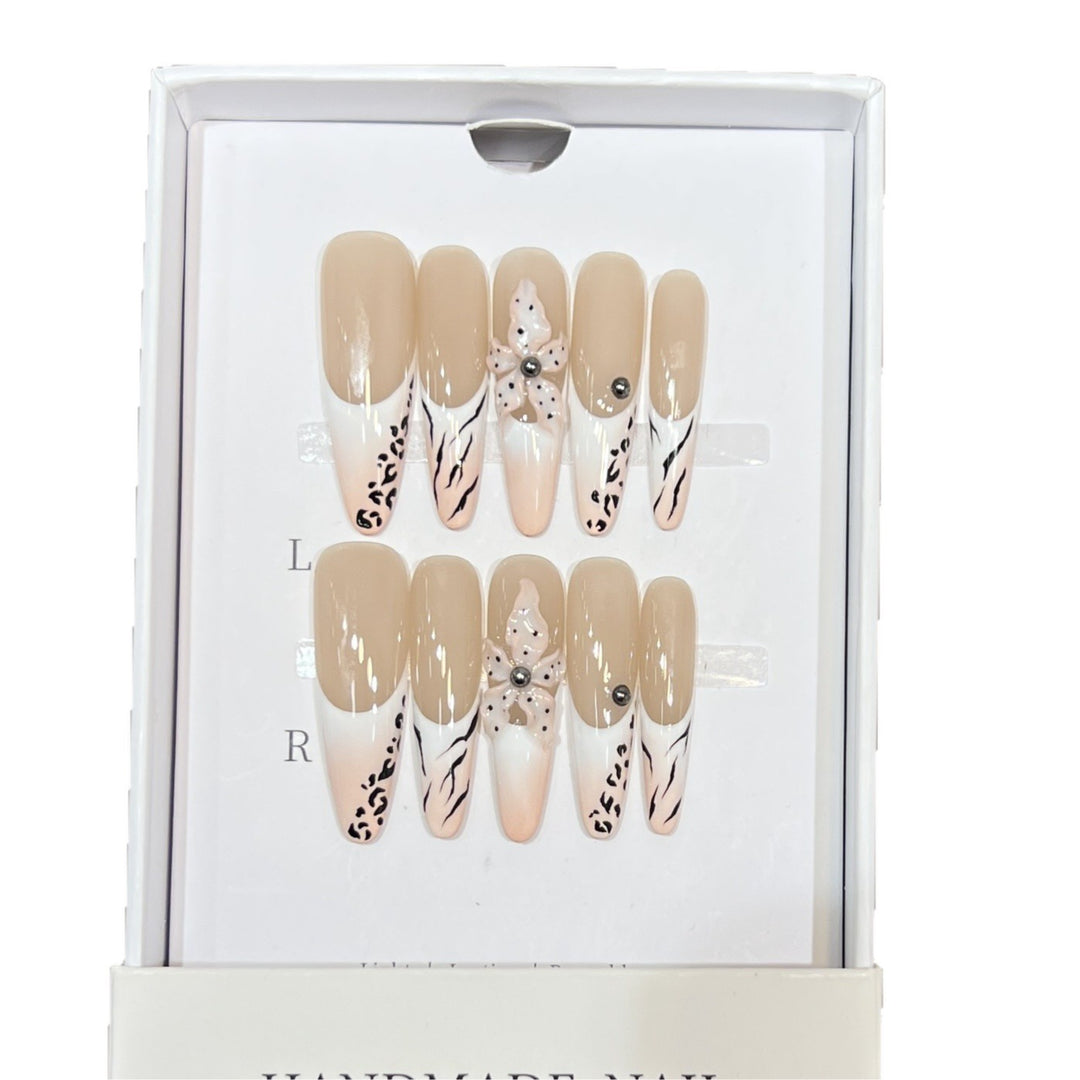 Artistic Stiletto Nail Art Set with Elegant Decorative Elements Stornfield