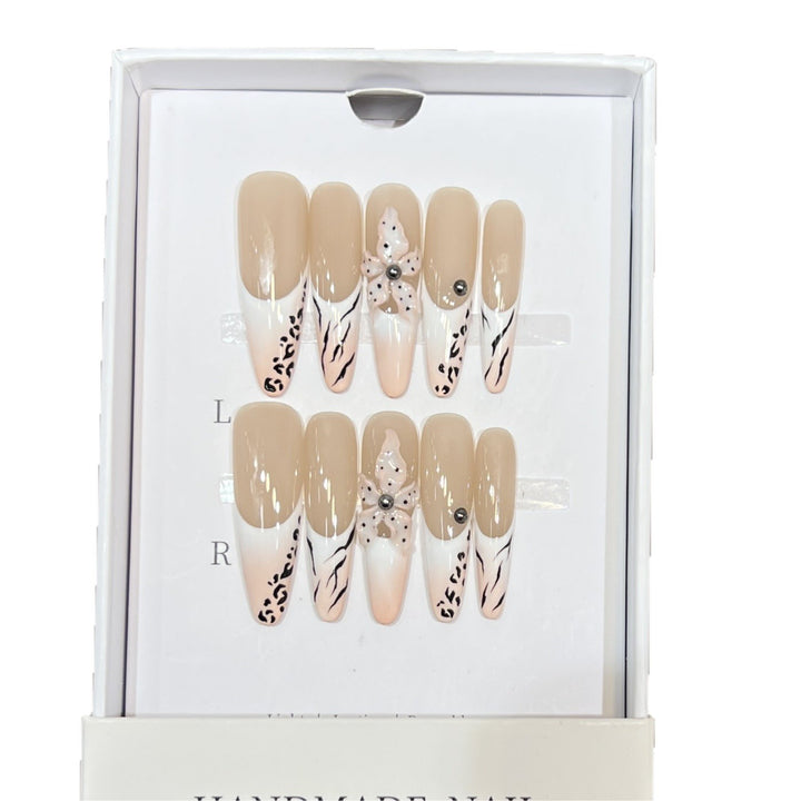 Artistic Stiletto Nail Art Set with Elegant Decorative Elements Stornfield