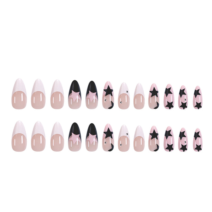 Artistic stiletto nails with star motif Stornfield