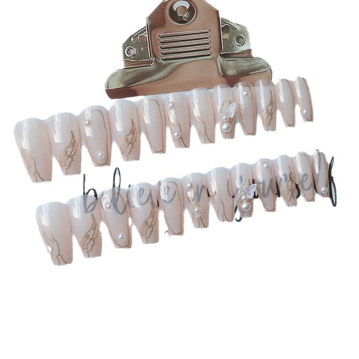 Artificial nails with elegant bows and pearl decorations Stornfield
