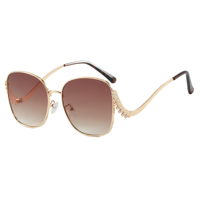 Women's striking sunglasses with sparkling appliqués Stornfield