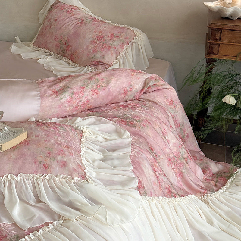Romantic satin bedding set with floral watercolor print and lavish chiffon ruffle