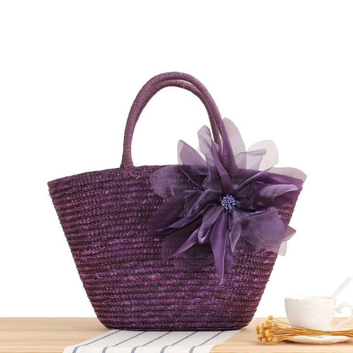 Elegant straw bag with floral accents Stornfield