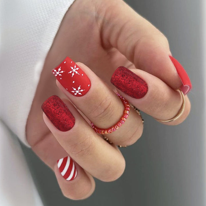 Artificial nail set in festive red with glitter and Christmas motifs Stornfield