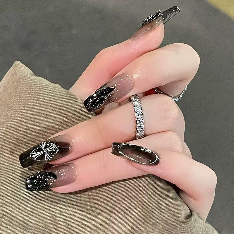 Glamorous artificial nails with heart design and glittering accents Stornfield