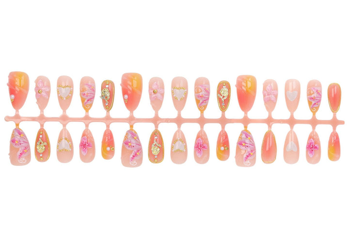 Artificial nail set with elegant floral decorations and glitter details Stornfield
