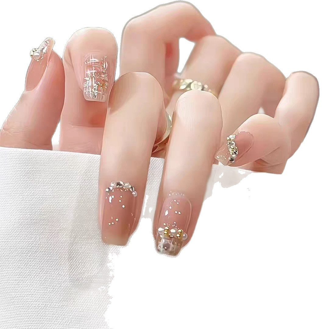 Artistic Press-On Nail Set with Elegant Floral and Decorative Accents Stornfield