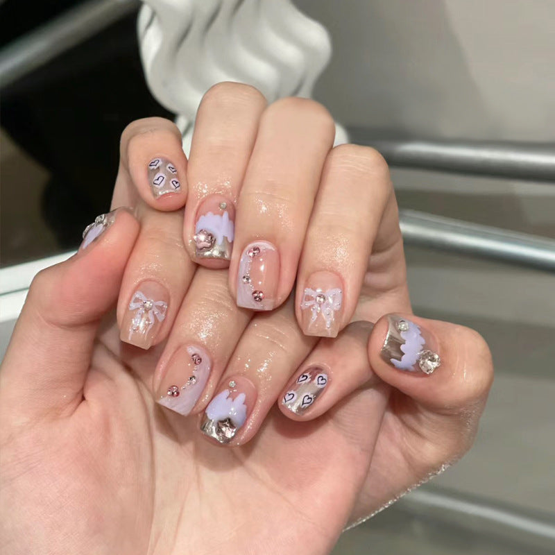 Artistic Press-On Nail Set with Floral and Heart Designs Stornfield