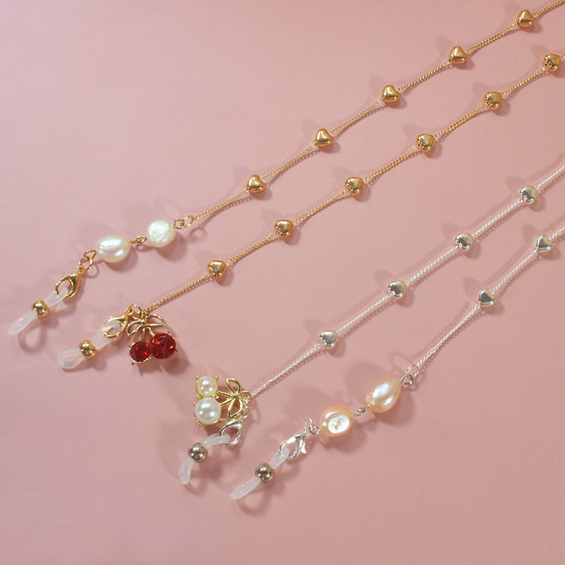 Elegant jewelry ribbon with pearls and silver accents Stornfield