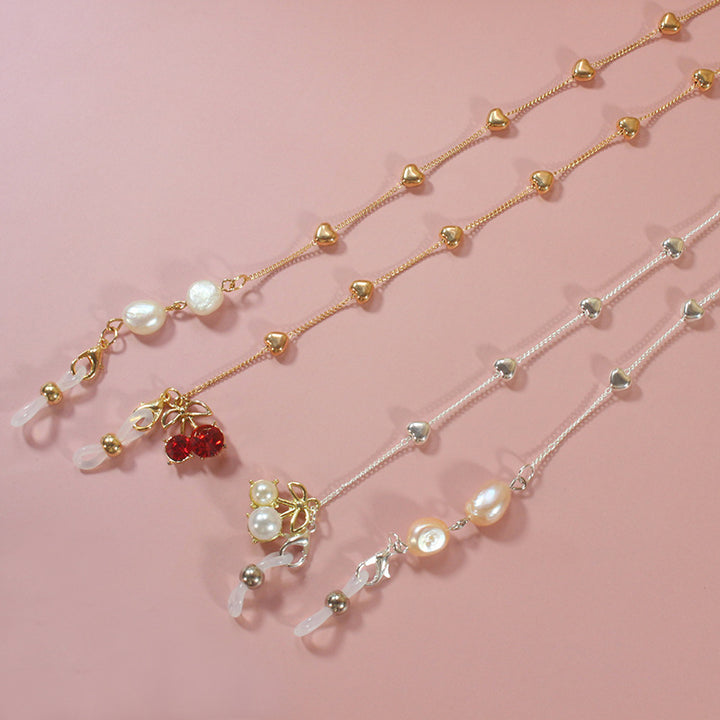 Elegant jewelry ribbon with pearls and silver accents Stornfield