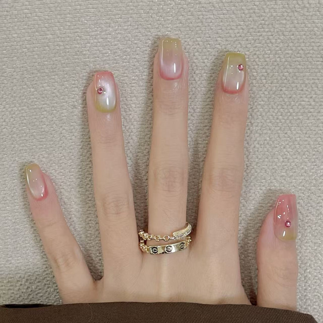 Artificial artificial nails with elegant ombre effects and glitter accents Stornfield