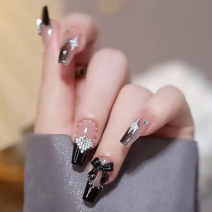 Acrylic nail set with glamorous 3D decorations and noble accents Stornfield