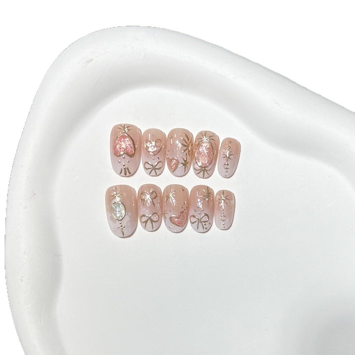 Decorative Press-On Nail Art Set with Heart and Glitter Accents Stornfield