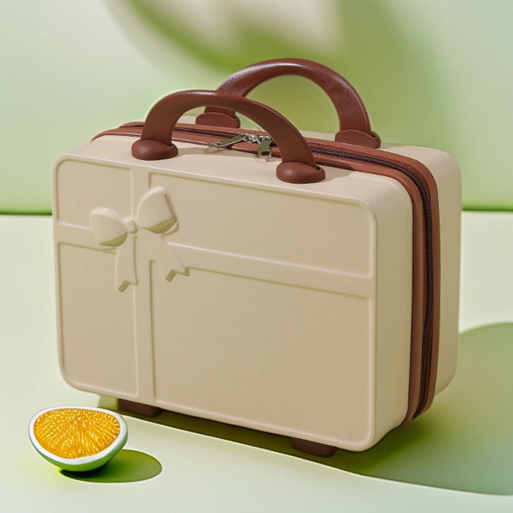 structured hard-shell cosmetic travel case with embossed bow and dual top handles Stornfield