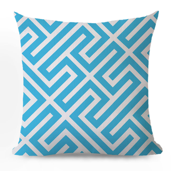 Decorative cushion with zigzag pattern from