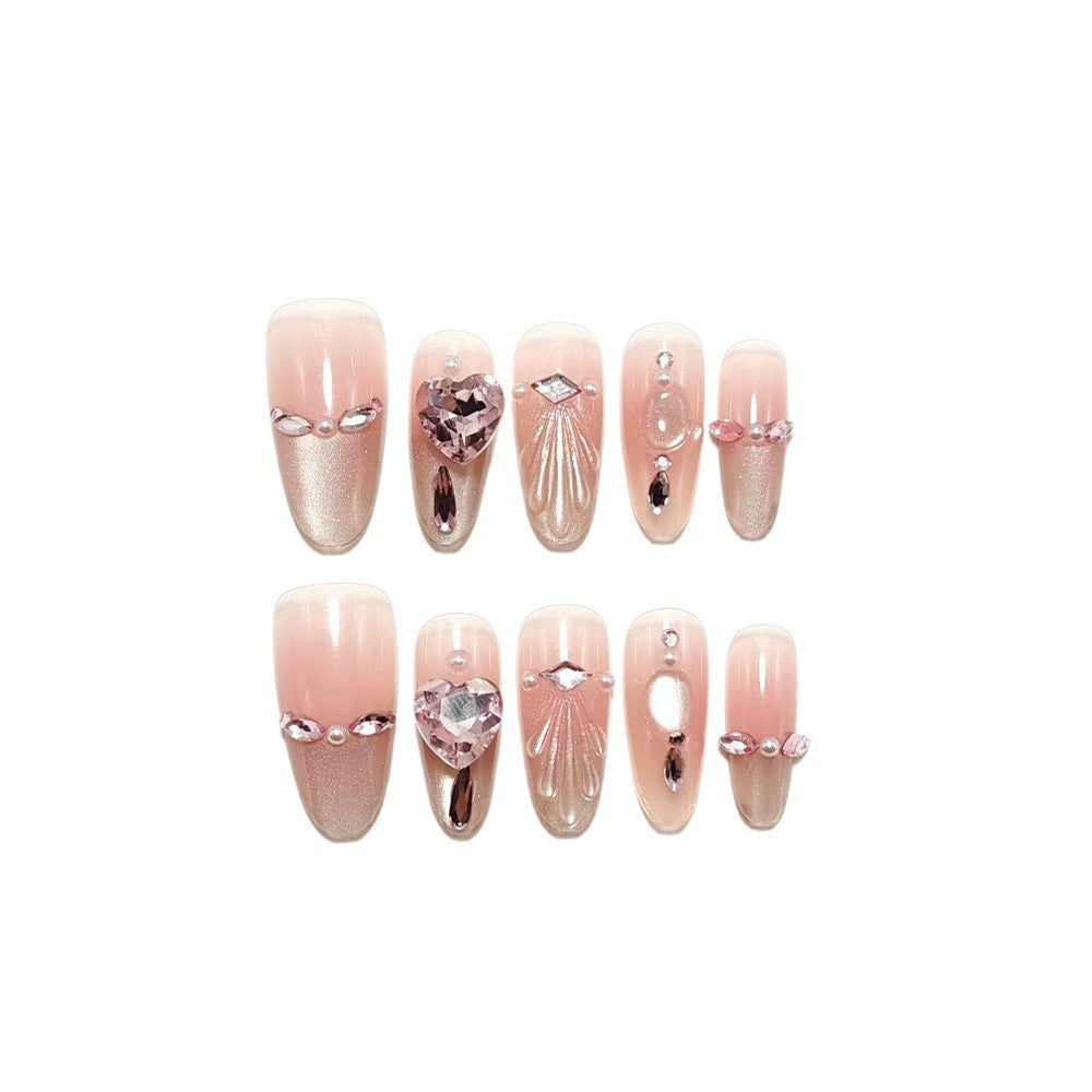 Artificial nails with sparkling heart and rhinestone accents Stornfield