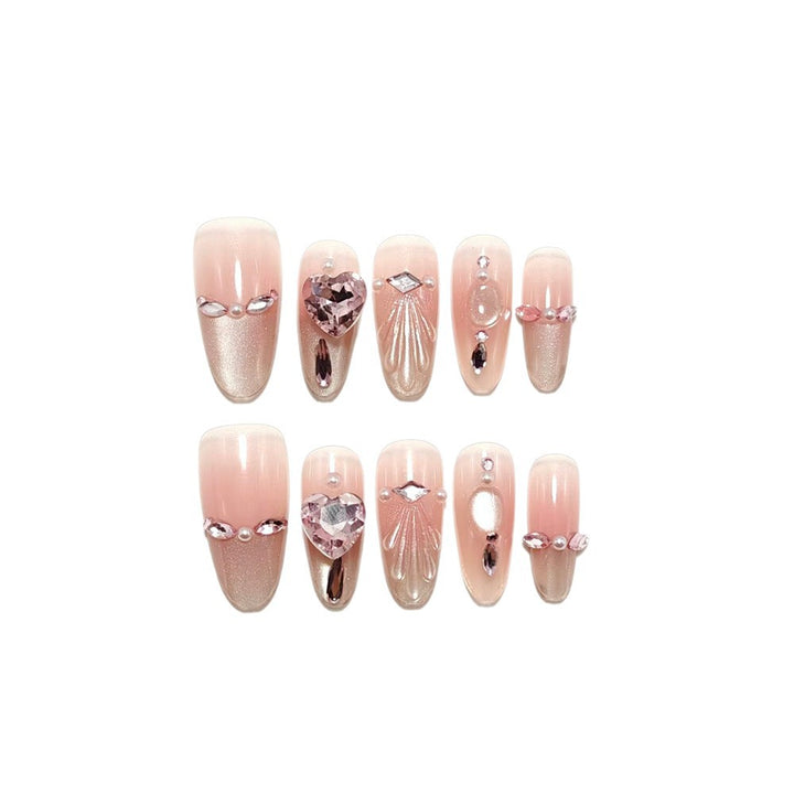 Artificial nails with sparkling heart and rhinestone accents Stornfield