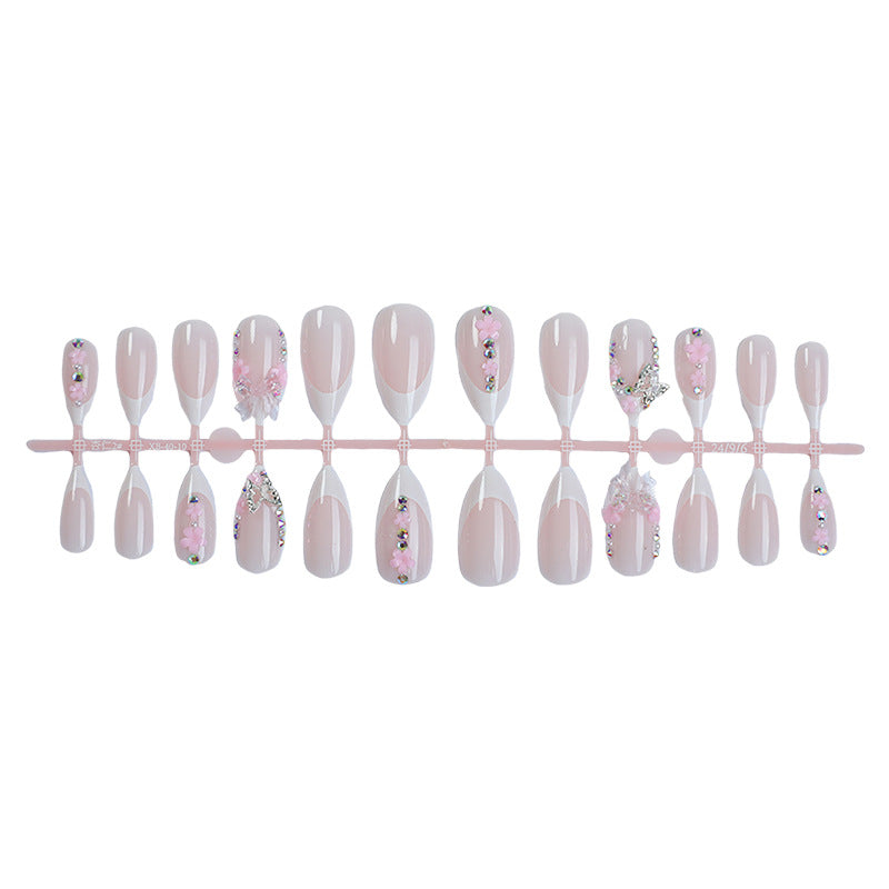 Creative nail art set with playful flower and glitter accents Stornfield