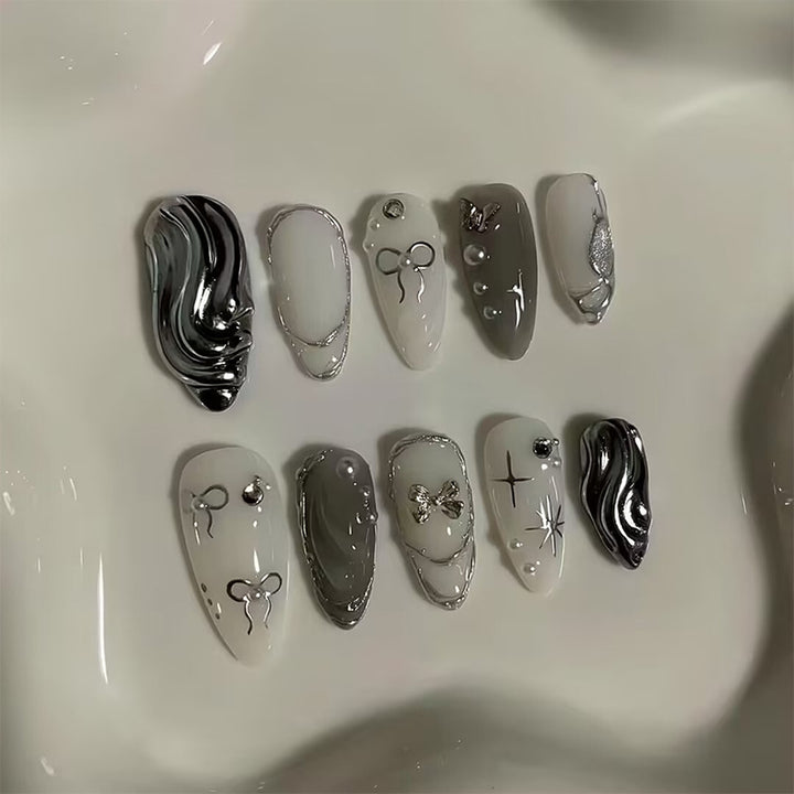 Nail set with luxurious 3D decorations and elegant stone accents Stornfield