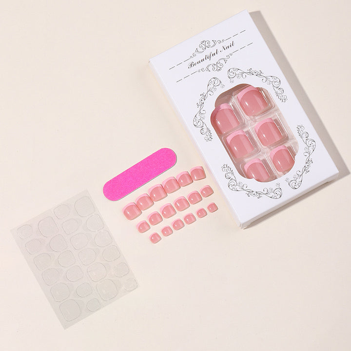 Nail art set with elegant French design and glitter accents Stornfield