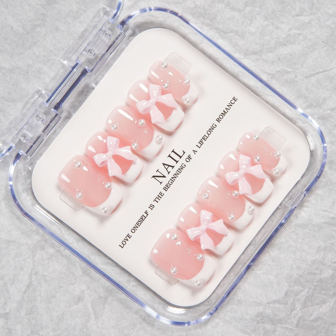 Decorative Press-On Nail Set with Bow and Pearl Accents