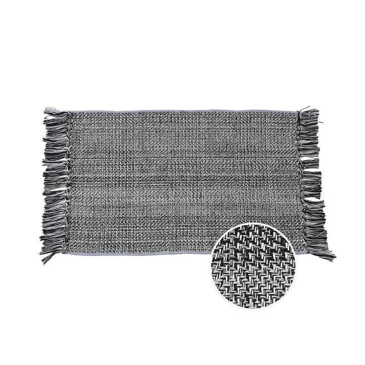 Woven table runner with dense herringbone jacquard and fringes Stornfield