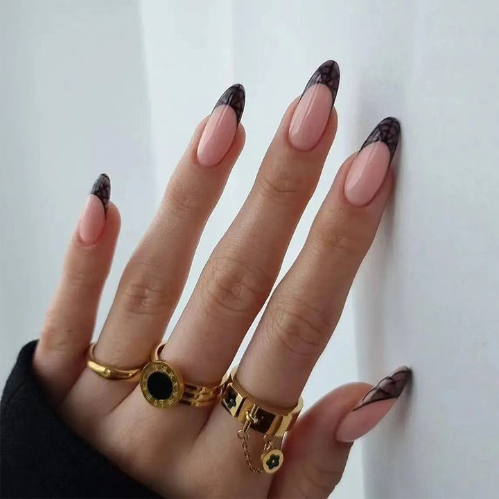 Artful nail tips with elegant spider web pattern Stornfield