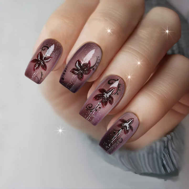 Artificial nails with floral accents Stornfield