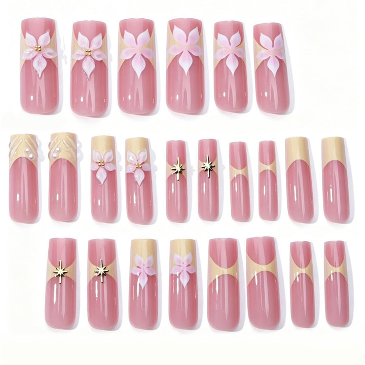 Artificial nail set with delicate flower and glitter elements Stornfield