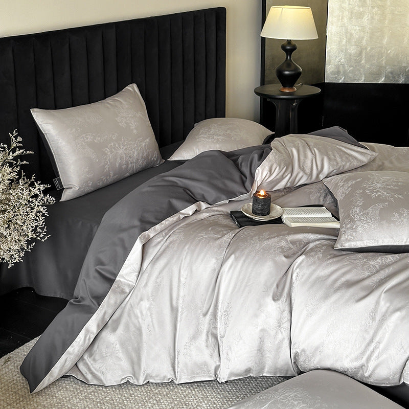Jacquard bedding set made of cotton satin with subtle butterfly relief and reversible function