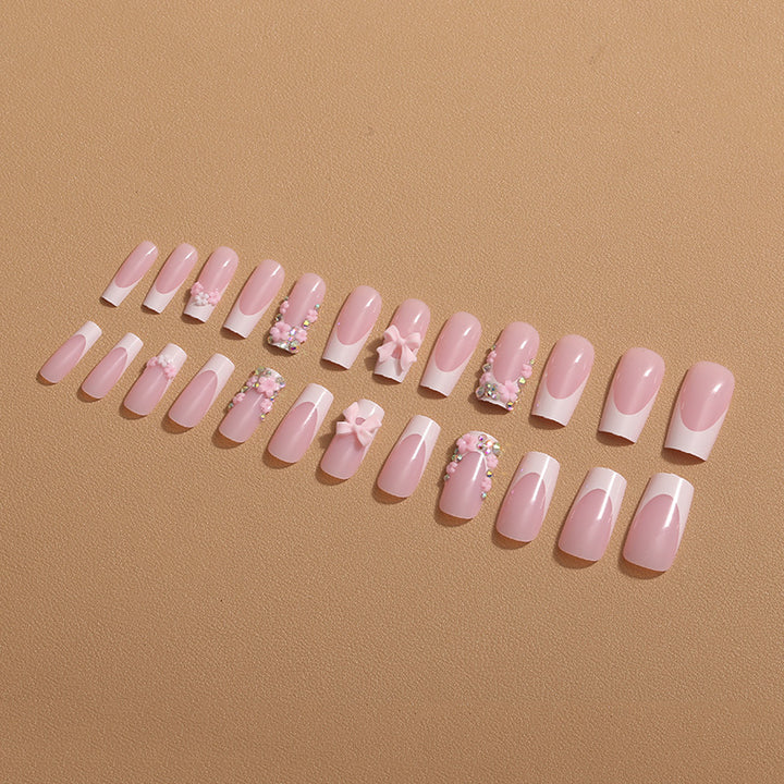 Art nail set with floral 3D accents and glitter decorations Stornfield