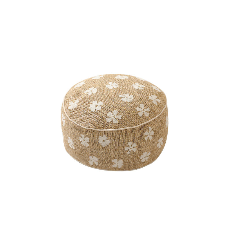 Flower-shaped floor pouf with cuddly teddy fleece surface and removable cover