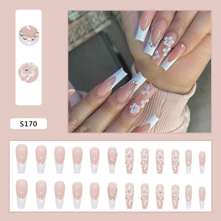 Artificial nail set with romantic floral decorations and glitter accents Stornfield