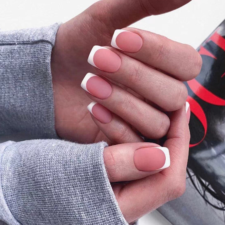 Artful nail extensions with an elegant leaf pattern Stornfield