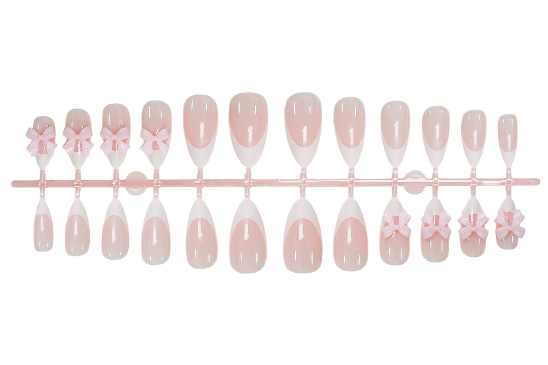Acrylic nail set with playful bow decorations Stornfield