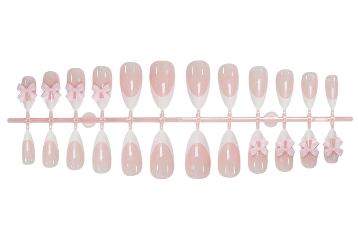 Acrylic nail set with playful bow decorations Stornfield