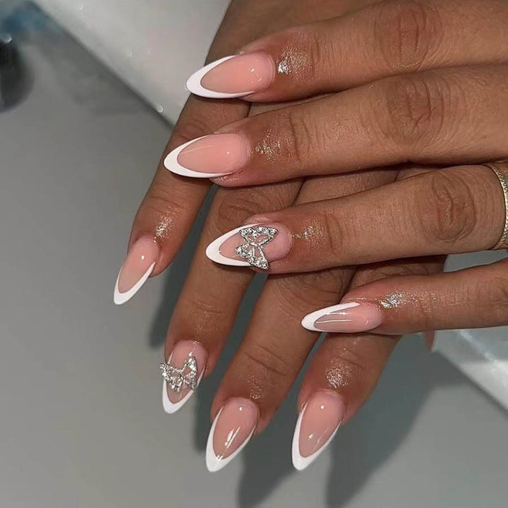 Artificial nail set with elegant French design and rhinestone-embellished accents Stornfield