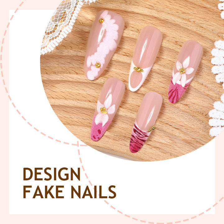 Artificial nail set with floral and elegant design elements Stornfield