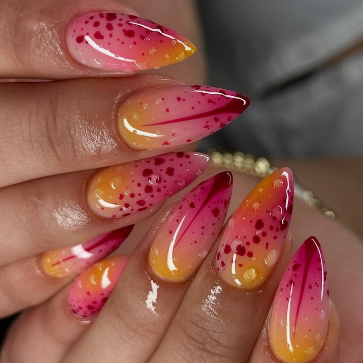 Creative artificial nails with appealing ombre and glitter effects Stornfield
