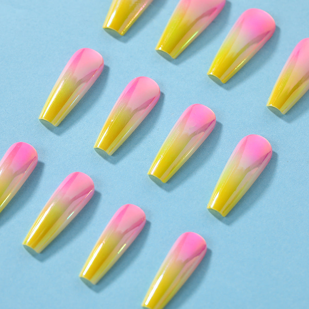 Artificial nail tips in modern ombre design Stornfield