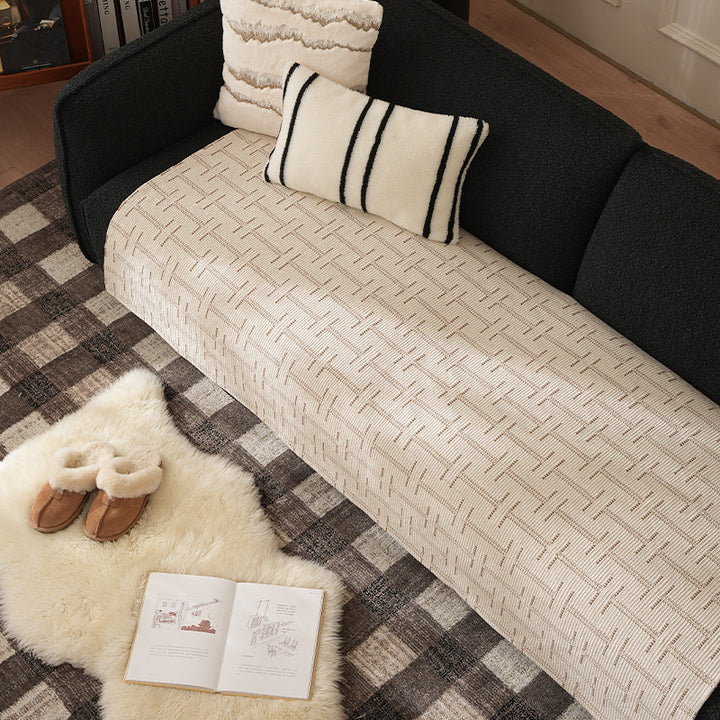 Woven rectangular table runner made of cotton blend with checkered pattern and striped border Stornfield